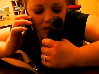 Cheating Wife on Phone With Husband While Sucking a BBC