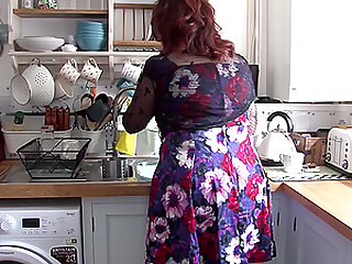 Redhead BBW amateur mature MILF masturbates in the kitchen